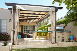 retractable canopies accent this space better than a louvered pergola