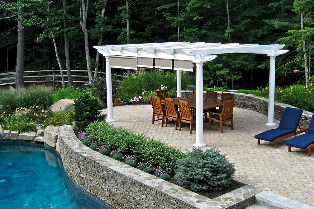 vista vinyl pergola poolside with retractable canopies