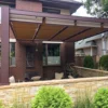 An Attached Outlook Aluminum Patio Cover shading an outdoor lounge space